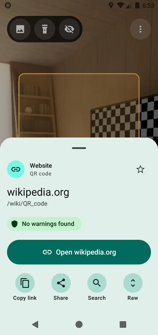The Verdetto result sheet showing a scanned QR code that leads to wikipedia.org, the No warnings found chip, and an Open button that names the site.